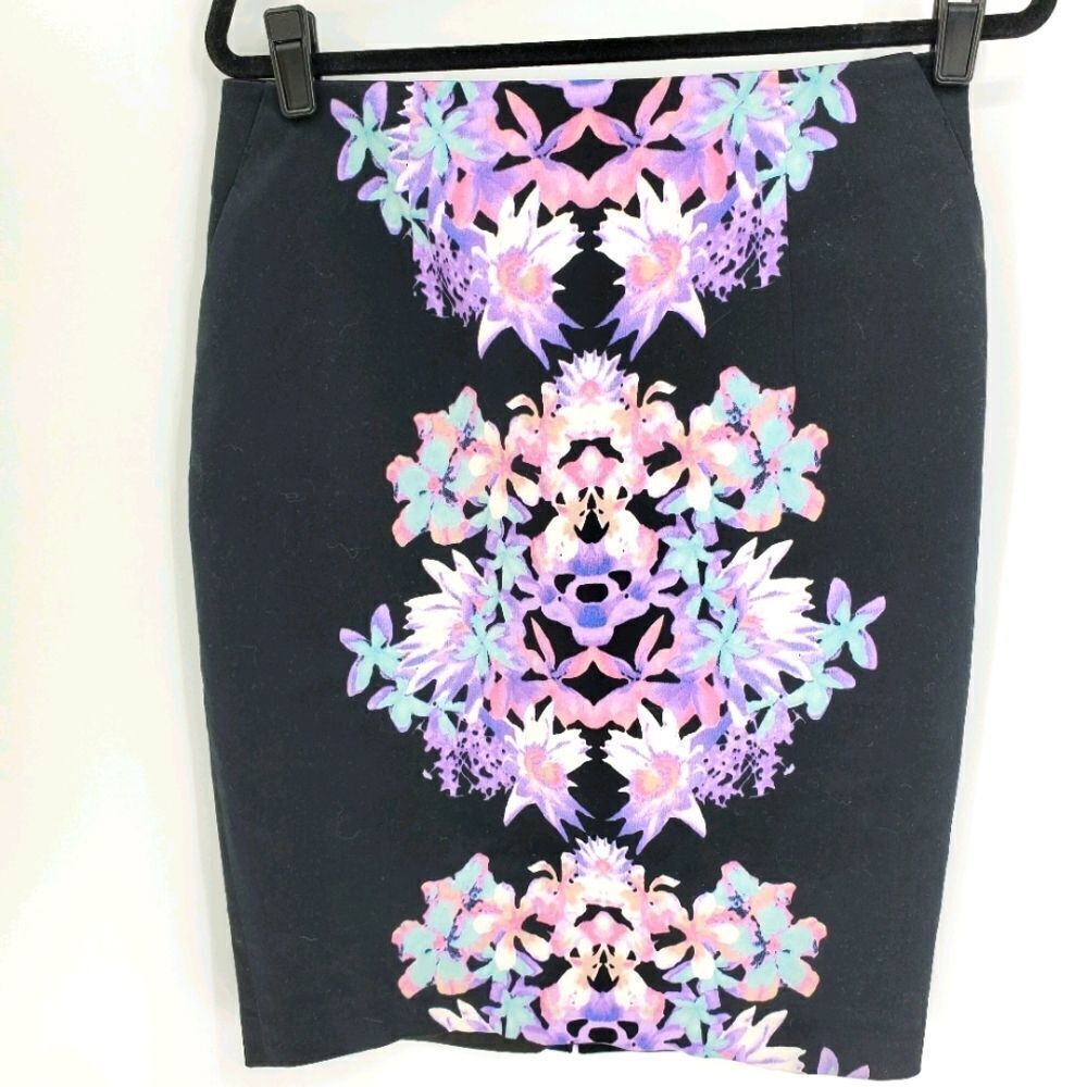 Skirt, black with beautiful print of lavender flowers‎ size 12..